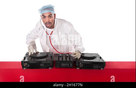 Mad African musician singer with stethoscope playing doctors  with a DJ music system Stock Photo