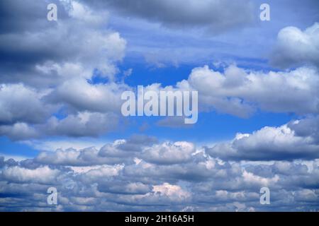 Sunshine clouds sky during morning background. Blue,white pastel heaven,soft focus lens flare sunlight. Abstract blurred cyan gradient of peaceful nat Stock Photo