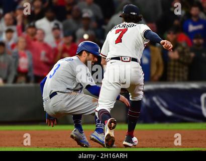 Atlanta, United States. 16th Oct, 2021. Los Angeles Dodgers center fielder Chris Taylor (3) is caught in a run down by Atlanta Braves shortstop Dansby Swanson (7) during the ninth inning in game one of the MLB NLCS at Truist Park on October 16, 2021, in Atlanta, Georgia. Atlanta beat Los Angeles 3-2 to take a 1-0 series lead. Photo by David Tulis/UPI Credit: UPI/Alamy Live News Stock Photo