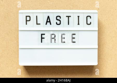 Lightbox with word plastic free on wood background Stock Photo