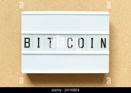 Lightbox with word on wood bit coin background Stock Photo