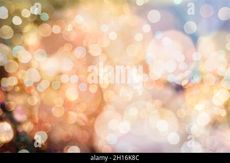 Abstract light celebration background with defocused golden lights for Christmas, New Year, Holiday, party Stock Photo