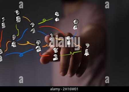 A person presenting the virtual projection of digital conference teamwork connection Stock Photo