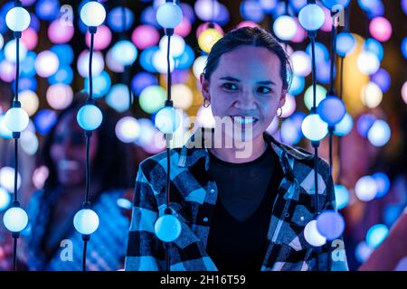 Orlando, Florida, USA. 12th Oct, 2021. People enjoy Immerse Festival by Creative City Project that turned downtown Orlando into a large scale interactive arts exhibition with performances, music, photo opportunities, entertainment, lighting installations and music. Hundreds of artists participated in the three days annual event that celebrates creativity. (Credit Image: © Ronen Tivony/SOPA Images via ZUMA Press Wire) Stock Photo