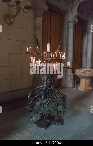 Sweden, Uppsala - April 19 2019: detailed view of Uppsala Cathedral interior, iron candle holder on April 19 2019 in Uppsala, Sweden. Stock Photo