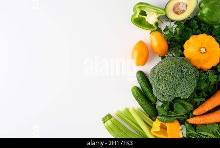 Vegan set of food. Colorful vegetables and fruits slices. Ingredients for healthy smoothies Stock Photo