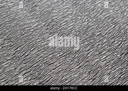 Surface texture of reflective metallic insulation material. Stock Photo