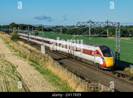 LNER 07.55 Azuma passenger train from Inverness Scotland passes Park Farm east of Linlithgow at 10.58 en route to London through Edinburgh Stock Photo