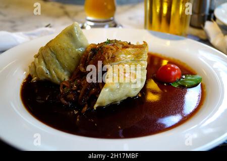 Swabian maultaschen or ravioli with minced meat and spinach Stock Photo