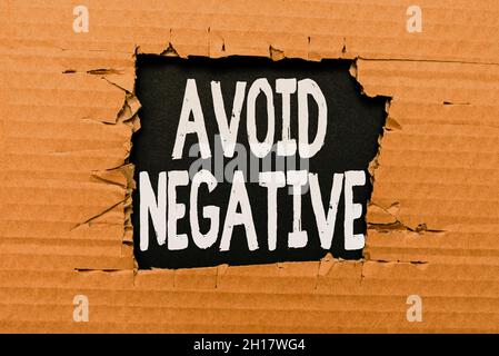 Hand writing sign Avoid Negative. Business approach Staying away from pessimistic showing Suspicious Depression Smart Office Plans Construction Stock Photo