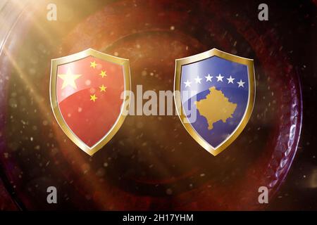 china and kosovo flag in golden shield on copper texture background. Stock Photo