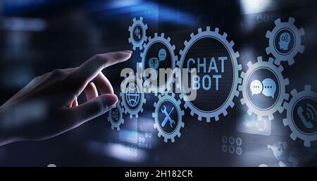 Chatbot computer program designed for conversation with human users over the Internet. Support and customer service automation technology concept. Stock Photo