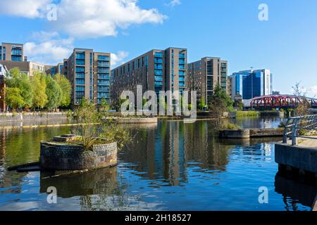 The Clippers Quay apartment blocks and the Exchange Quay office buildings over the Manchester Ship Canal, Salford, Manchester, England, UK Stock Photo