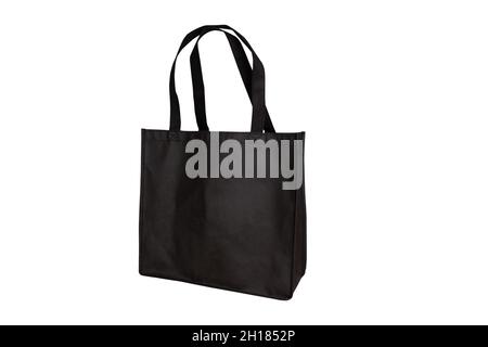 Mockup black tote bag fabric for shopping, mock up canvas bag textile with reusable isolated on white background. Stock Photo