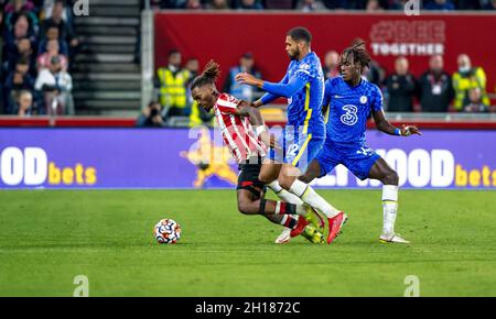 Ivan Toney of Brentford FC  is tackled by Ruben Loftus-Cheek of Chelsea FC during the Premier League match between Brentford and Chelsea at Brentford Community Stadium, London, England on 16 October 2021. Photo by Phil Hutchinson. Editorial use only, license required for commercial use. No use in betting, games or a single club/league/player publications. Stock Photo