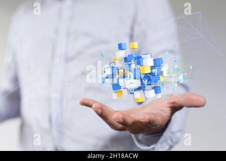 A 3D small data cloud technology. Polygonal wireframe art looks like constellation in a hand Stock Photo