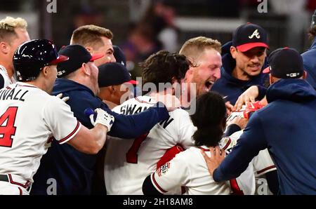 Atlanta, United States. 17th Oct, 2021. Atlanta Braves' Austin Riley hits a  walk off RBI single that scores teammate Ozzie Albies for a 3-2 win over  the Los Angeles Dodgers during the