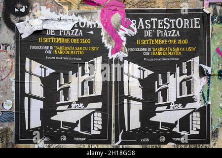 Torn Trastestorie de' Piazza theatre posters on wall in Trastevere district of Rome, Italy Stock Photo