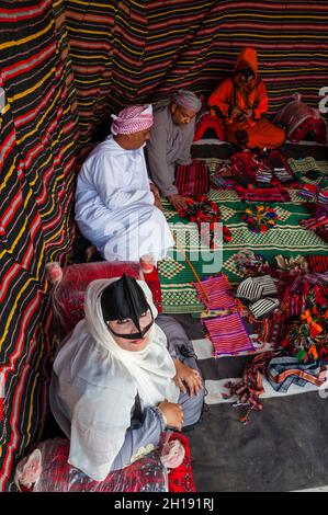 Bedouin family in a traditional tent. Stock Photo