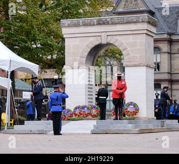 Halifax, Nova Scotia, Canada. October 17th, 2021. Representative from the Truro police force salutes monument to fallen officers after laying a wreath in honour of Nova Scotia Peace Officers who died in line of duty. This marks the 39th annual Peace Officers' Memorial, held at the Grand Parade in downtown Halifax. The event honours peace officers based in Nova Scotia who died in the line of duty and is a humbling reminder of their selflessness and dedication. Credit: meanderingemu/Alamy Live News Stock Photo