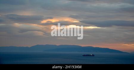 Lenticular cloud, altocumulus, lenticularis, formed over Kvarner bay near Rijeka city, Croatia Stock Photo