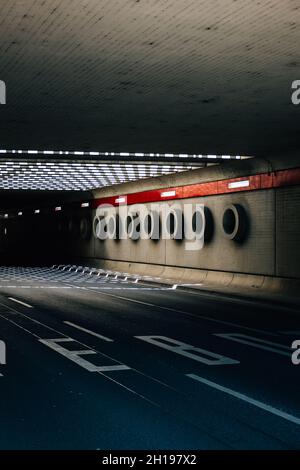 Germany, Berlin, Tegel Airport, a view of a tunnel road with sunlight shade Stock Photo