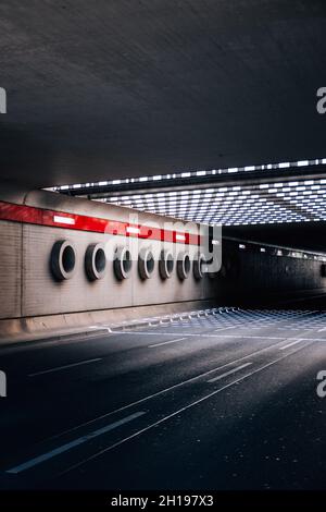 Germany, Berlin, Tegel Airport, a view of a tunnel road with sunlight shade Stock Photo