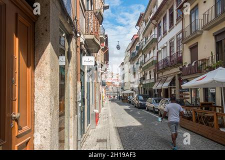 Street view Vila Nova de Gaia district with cable cars visible, of Porto. Portugal. Stock Photo