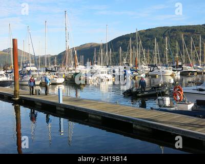 Scottish tourism on the Cowal Peninsula: autumn sunshine and beautiful scenery with yachts in the marina on the Holy Loch near Dunoon. Stock Photo