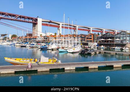 Lisbon, Portugal - August 15, 2017: Marina near the 25 de Abril Bridge, coastal photo taken on a sunny summer day Stock Photo