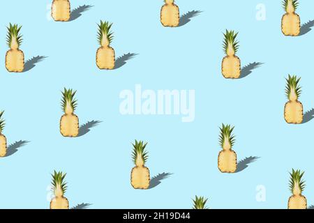 Creative pattern with pineapple on blue background. Minimal summer concept. Stock Photo