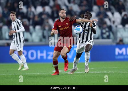 Torino, Italy. 17th Oct, 2021. Moise Kean of Juventus Fc and Bryan Cristante of As Roma battle for the ball during the Serie A match between Juventus Fc and As Roma at Allianz Stadium on October 17, 2021 in Turin, Italy. Credit: Marco Canoniero/Alamy Live News Stock Photo