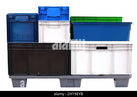 Colorful plastic boxes isolated on white background, logistic concept Stock Photo