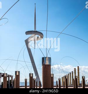 The Montjuïc Communications Tower, popularly known as Torre Calatrava and Torre Telefónica, is a telecommunication tower in the Montjuïc neighborhood. Stock Photo