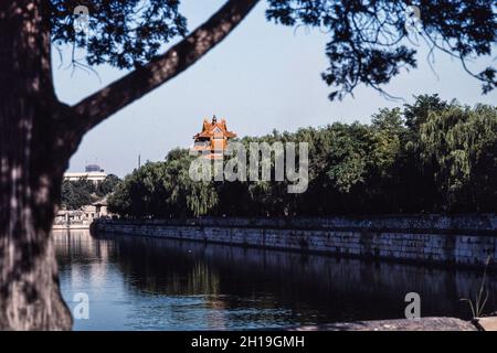 The corner watchtower and moat or Tongzi He of the Forbidden City in Beijing, China. Stock Photo