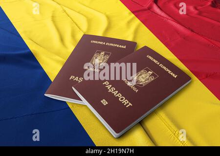 Romania passport on the Romanian flag, Romanian passport is an international travel document issued to nationals of Romania Stock Photo