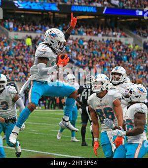 Miami Dolphins outside linebacker Jaelan Phillips (15) in coverage during  an NFL football game against the Jacksonville Jaguars at Tottenham Hotspur  Stadium in London, Sunday, Oct. 17, 2021. The Jacksonville Jaguars defeated