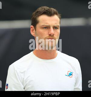 Miami Dolphins quarterback Reid Sinnett (4) watches a video replay on the  board during an NFL football game against the Cincinnati Bengals, Sunday,  Aug. 29, 2021, in Cincinnati. (AP Photo/Zach Bolinger Stock