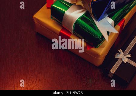 Various Christmas and New Year's gifts of handmade ornaments on a wood table. Stock Photo
