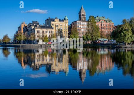 Norrkoping city and Motala river at Refvens grund on a sunny autumn day in October 2021. Norrkoping is a historic town in Sweden Stock Photo