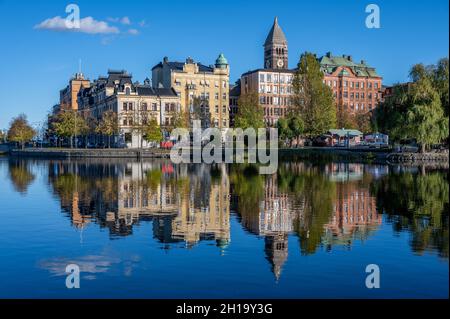 Norrkoping city and Motala river at Refvens grund on a sunny autumn day in October 2021. Norrkoping is a historic town in Sweden Stock Photo