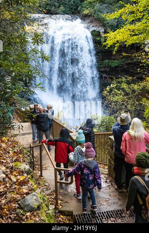 Families and friends enjoying the breathtaking beauty of Dry Falls between Highlands and Franklin, North Carolina, on a beautiful fall day. (USA) Stock Photo