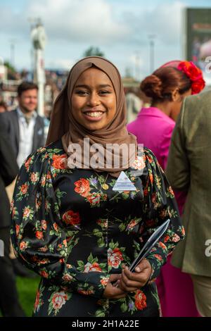 Ascot, Berkshire, UK. 16th October, 2021. Khadijah Mellah from Peckham who made history as the first British hijab wearing jockey in a competitive British horse race. Despite being new to horse-racing, she won the Magnolia Cup on her mount Haverland at Goodwood. Her story was the subject of the television documentary called Riding the Dream first broadcast on 16 November 2019. Credit: Maureen McLean/Alamy Stock Photo