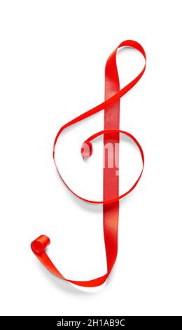Violin clef made of red ribbon on white background Stock Photo
