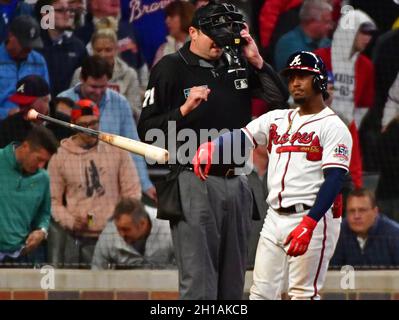 Atlanta, United States. 17th Oct, 2021. Atlanta Braves second baseman Ozzie Albies tosses his bat after striking out in the 5th inning in game two of the MLB NLCS against the Los Angeles Dodgers at Truist Park in Atlanta, Georgia on Sunday, October 17, 2021. Photo by David Tulis/UPI Credit: UPI/Alamy Live News Stock Photo