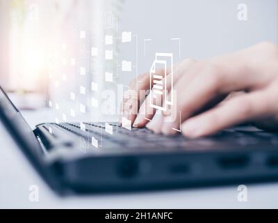 Document management. Document file information and folders icons with businessman hands working on laptop computer, online digital databases, data sys Stock Photo