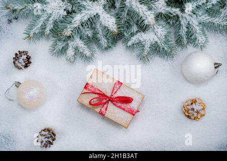 Christmas background with gift boxes in snow Stock Photo