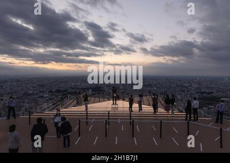 Tokyo, Japan. 15th Oct, 2021. Visitors of Shibuya Sky take photos on the upper floor of the observation deck during sunset.Shibuya Sky is a new attraction for domestic and international tourists with a great view over Tokyo. (Credit Image: © Stanislav Kogiku/SOPA Images via ZUMA Press Wire) Stock Photo