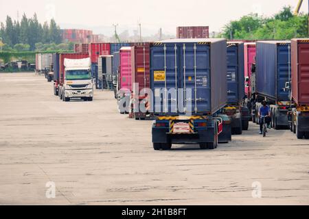 Container trucks on the port international transport logistics Stock Photo