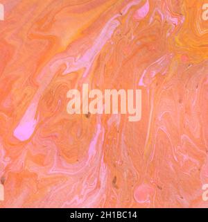 Acrylic texture made in liquid pour technique. Background in pink and orange colors. Stock Photo